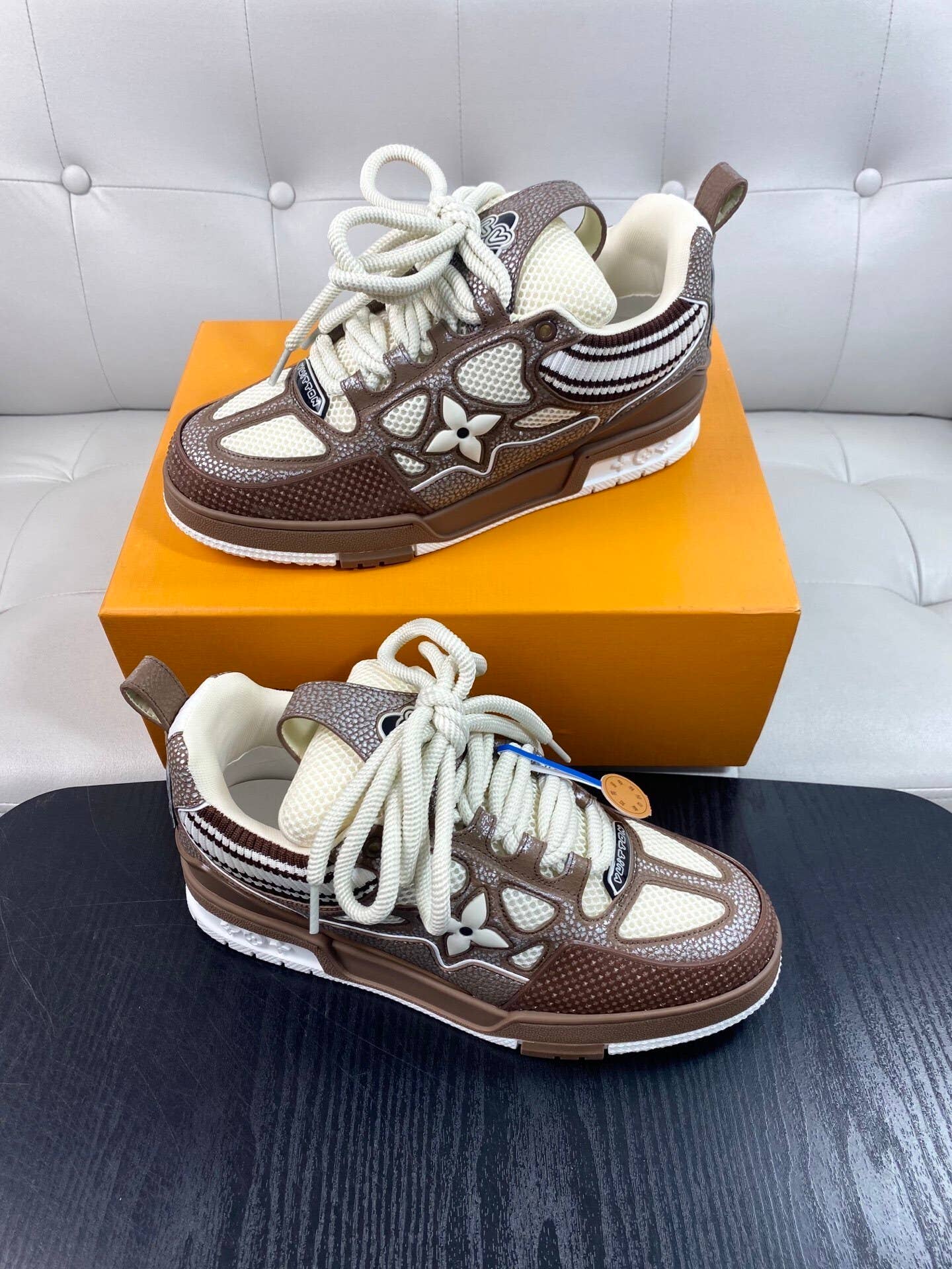 LV Skate Sneakers in a brown and white colorway.