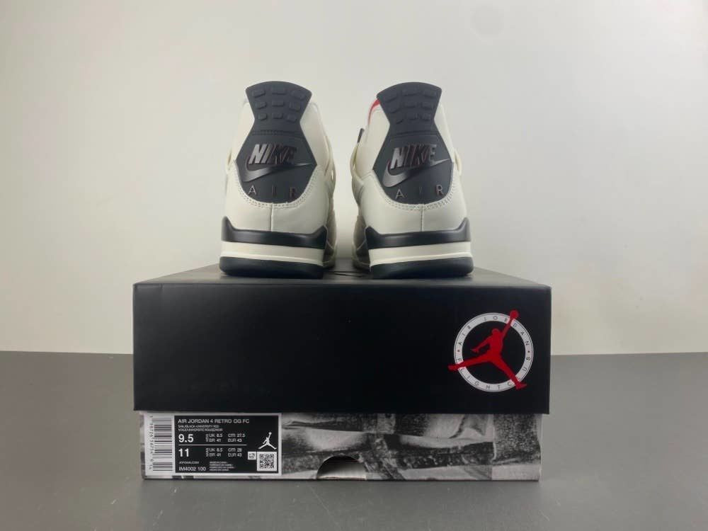 4 Retro 'Flight Club' sneakers in a white and black