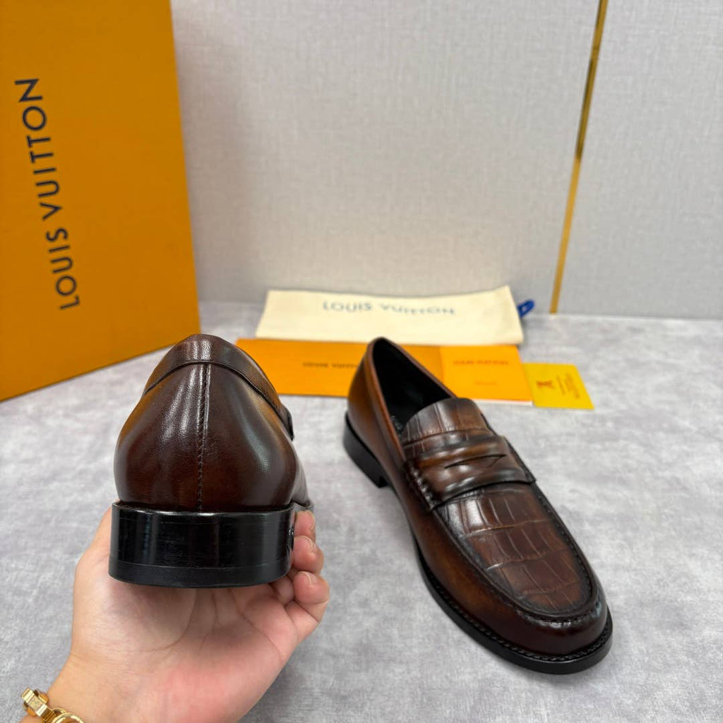 alligator-embossed leather loafers