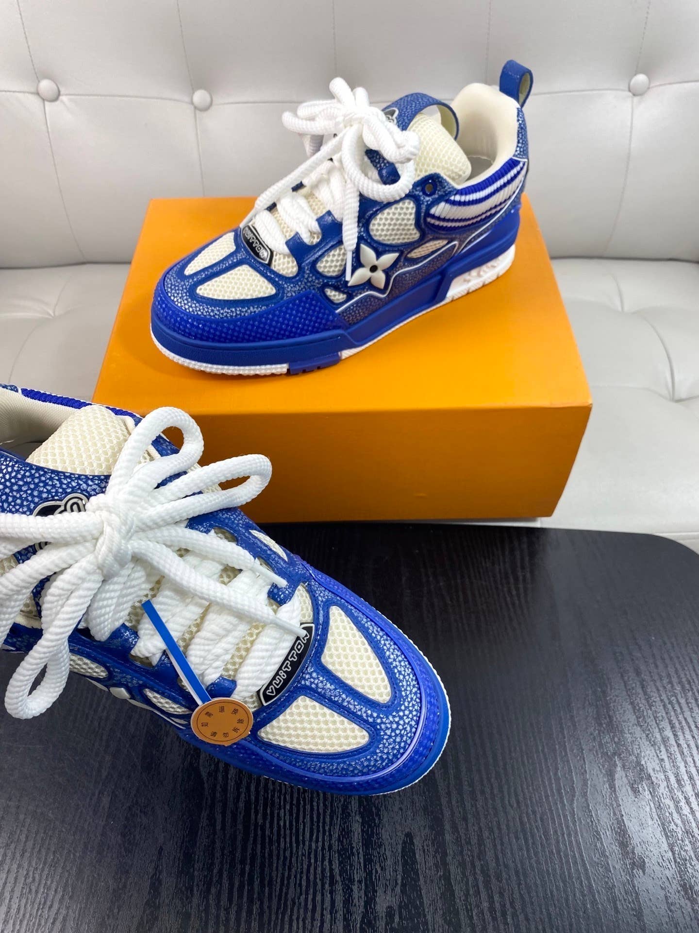 blue and white LV Skate sneakers