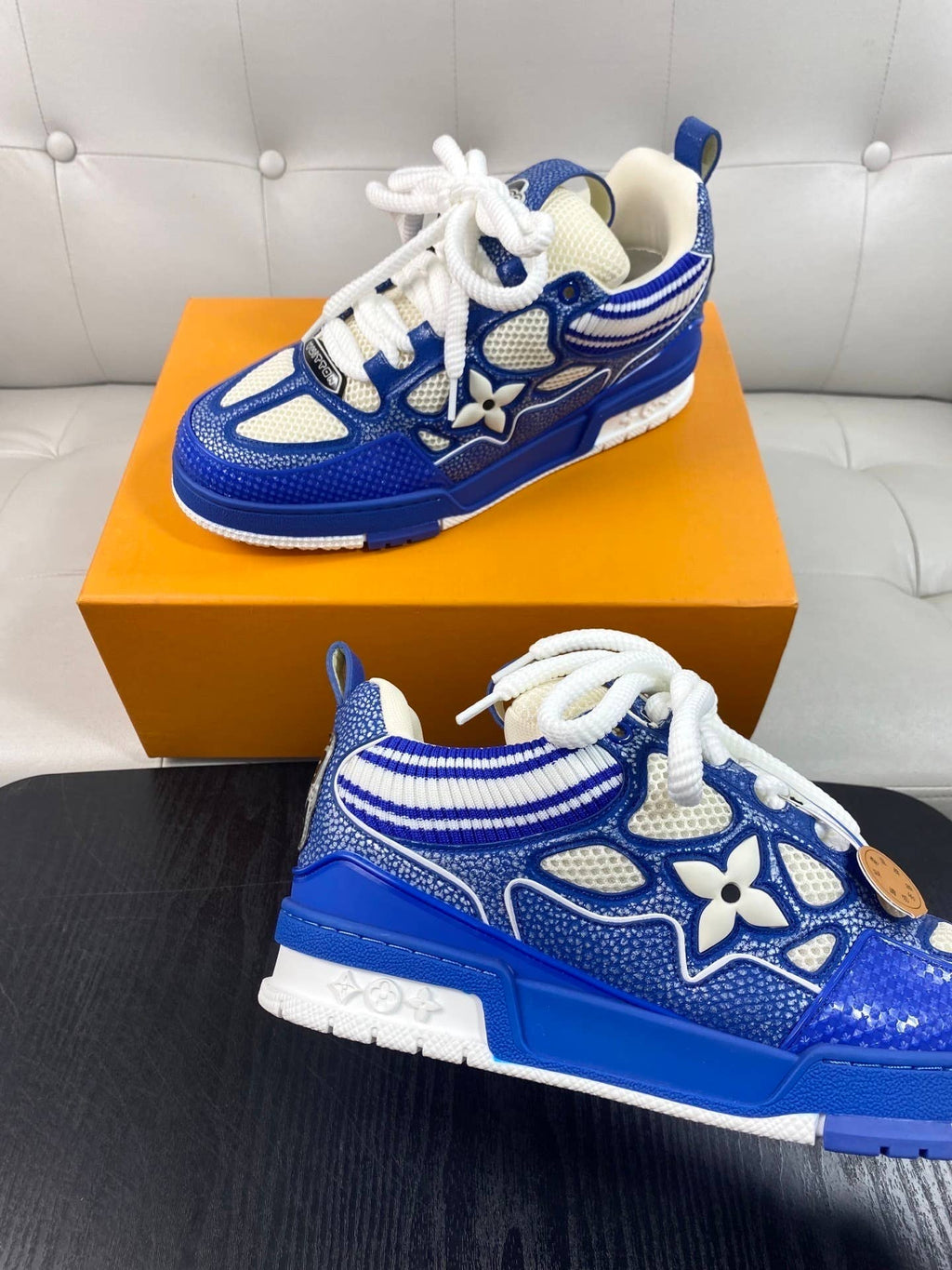 blue and white LV Skate sneakers