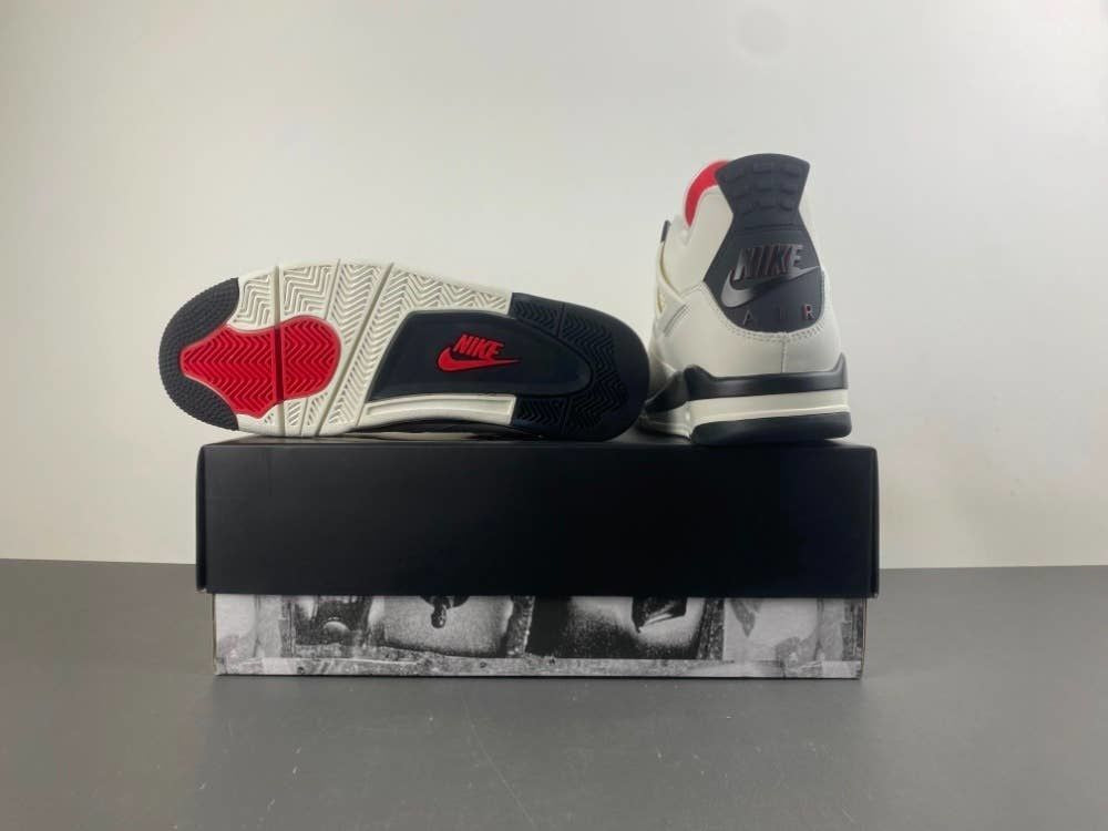 4 Retro 'Flight Club' sneakers in a white and black