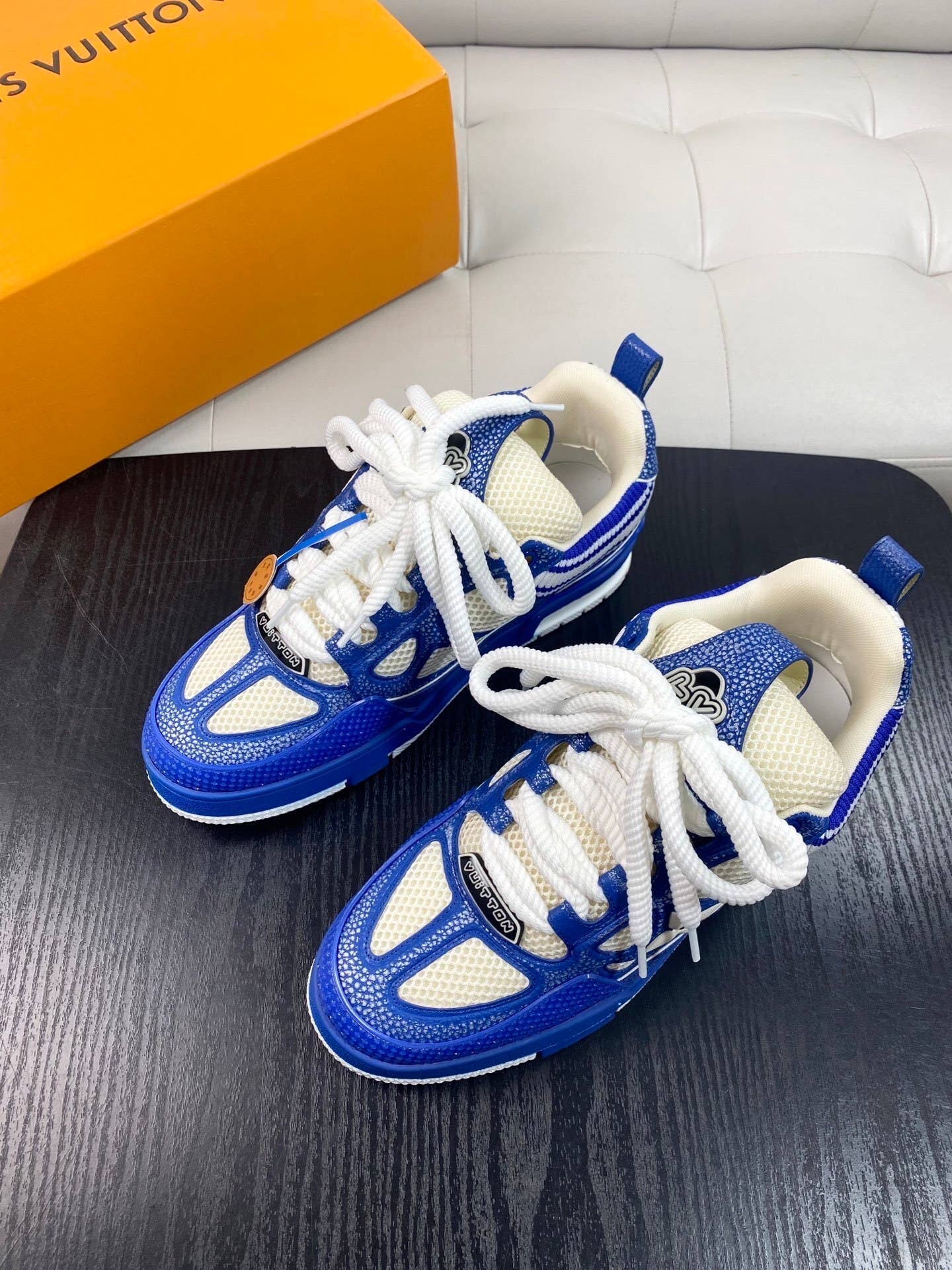 blue and white LV Skate sneakers