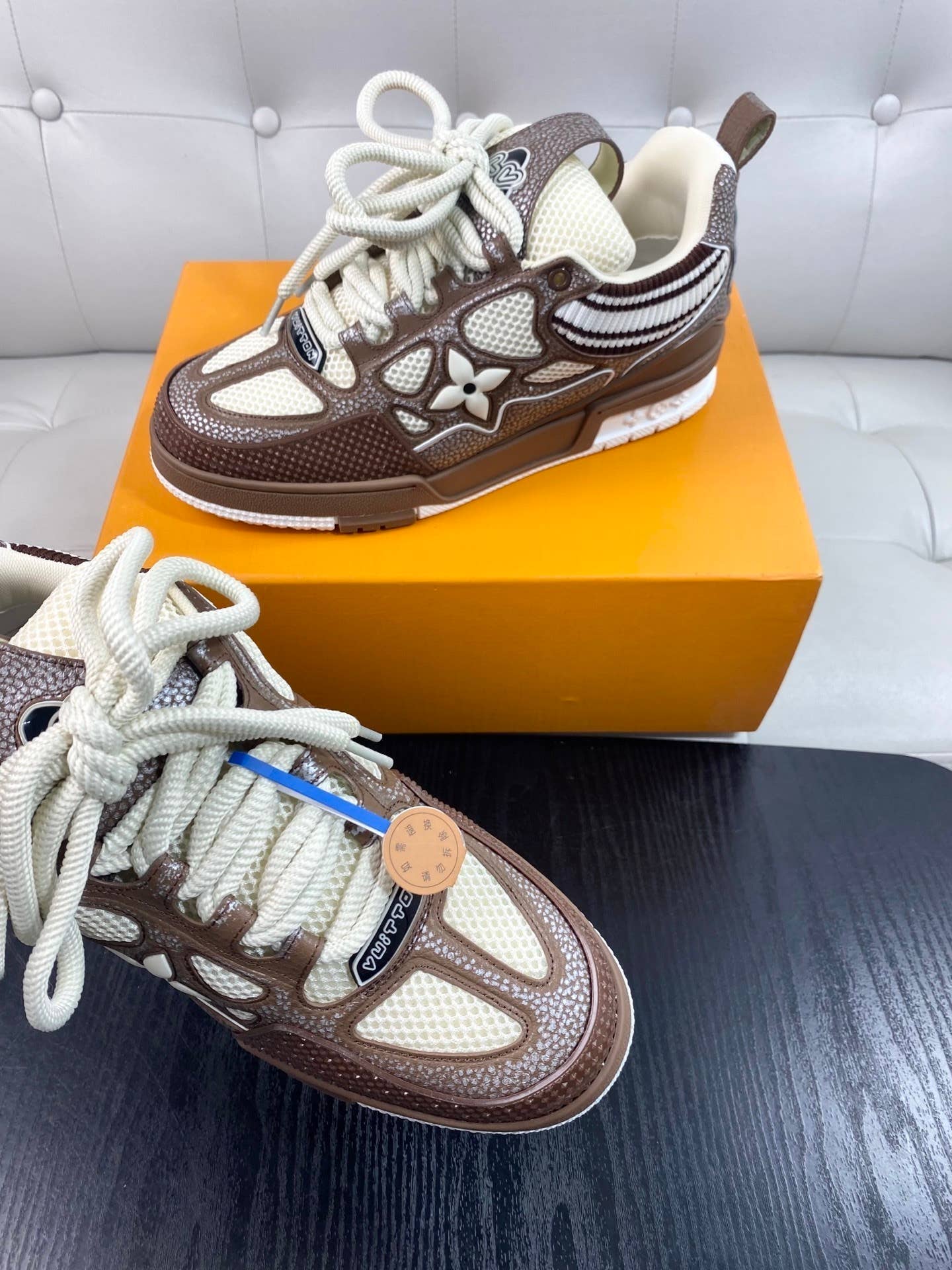 LV Skate Sneakers in a brown and white colorway.