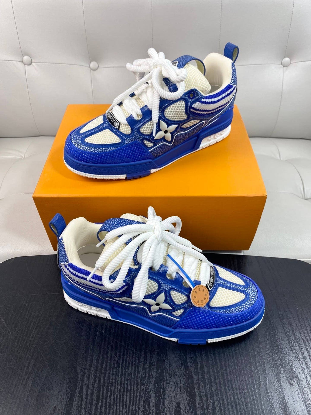 blue and white LV Skate sneakers