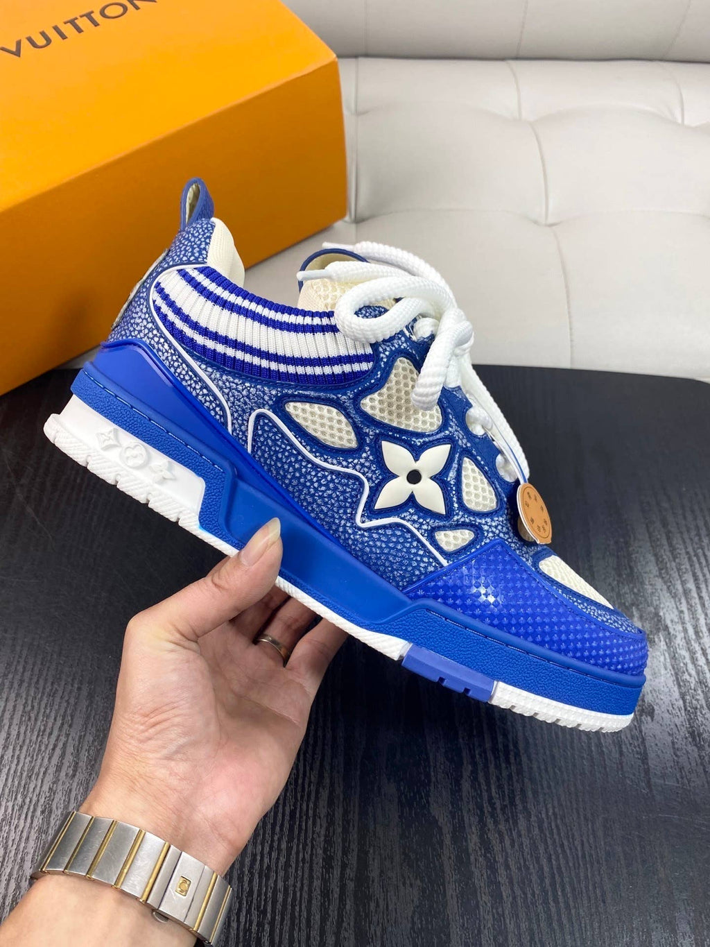 blue and white LV Skate sneakers