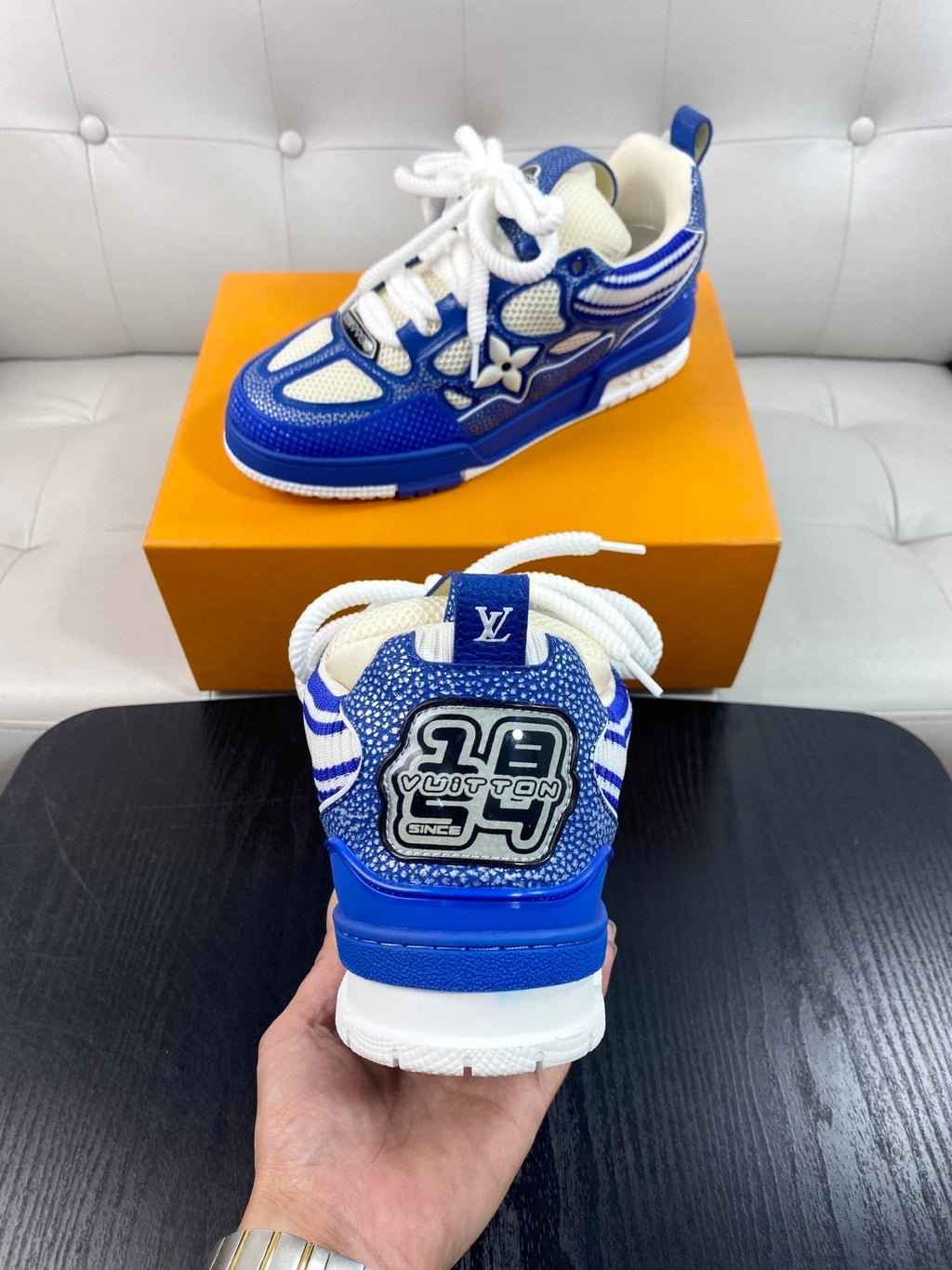blue and white LV Skate sneakers