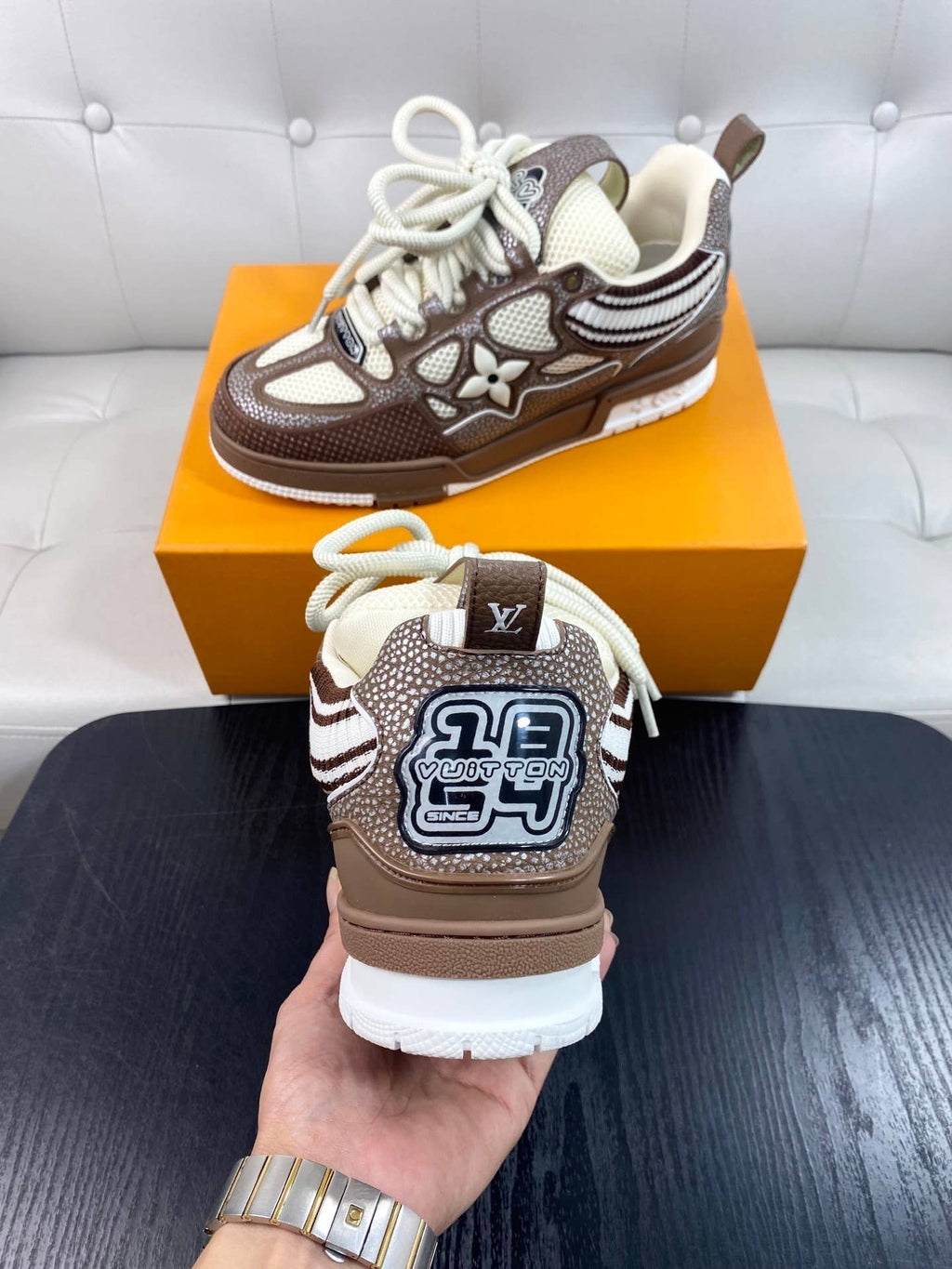 LV Skate Sneakers in a brown and white colorway.