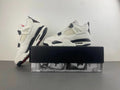 4 Retro 'Flight Club' sneakers in a white and black