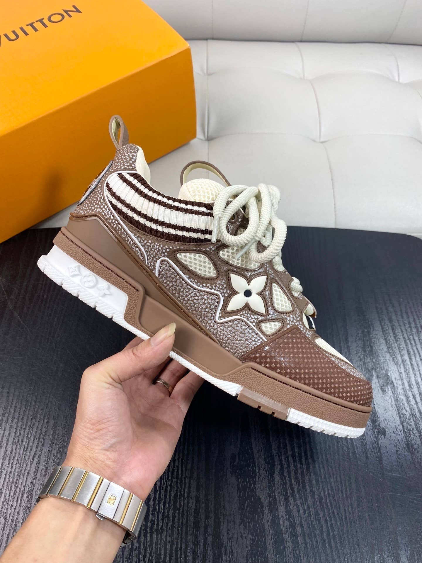 LV Skate Sneakers in a brown and white colorway.