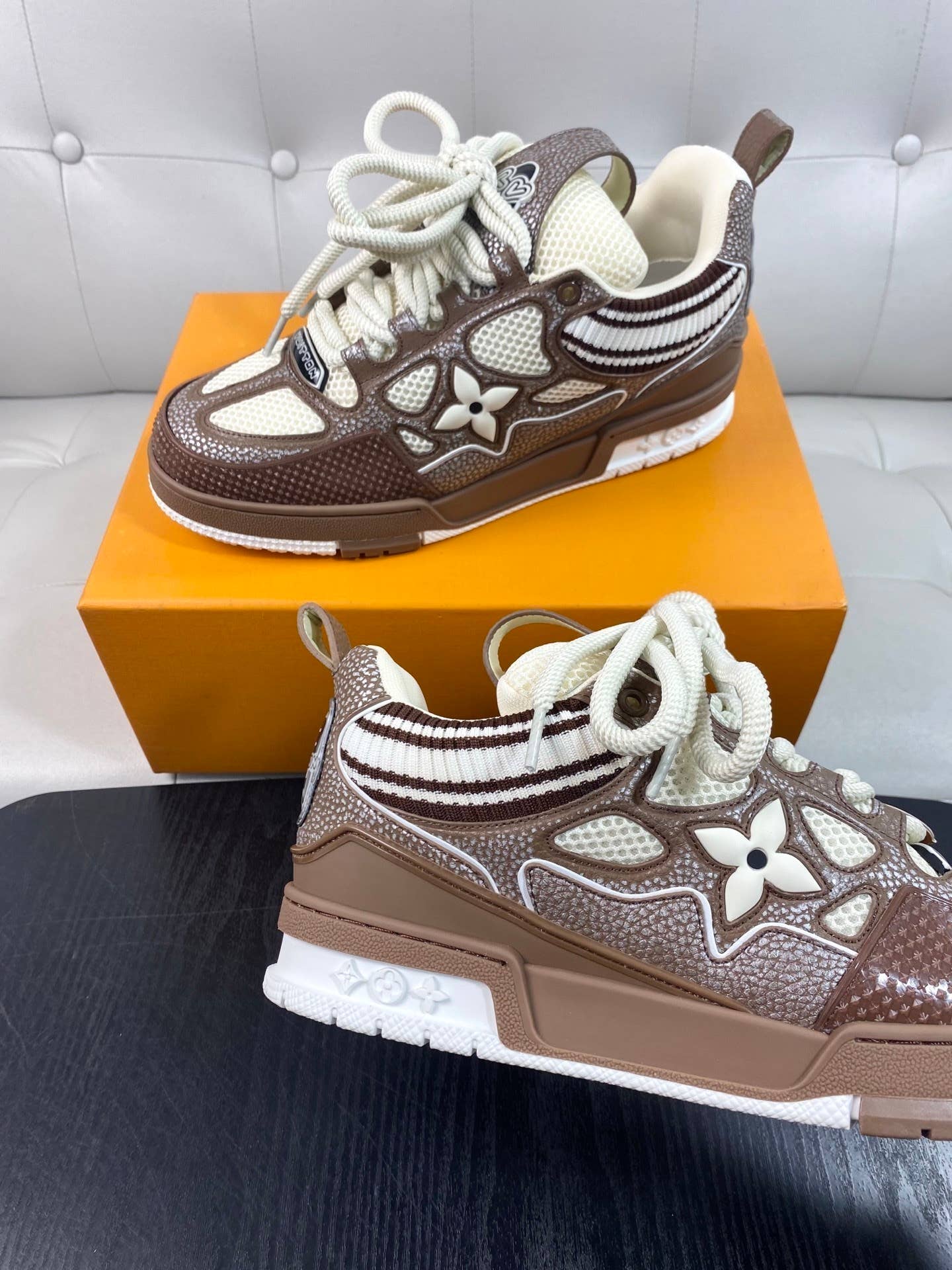 LV Skate Sneakers in a brown and white colorway.